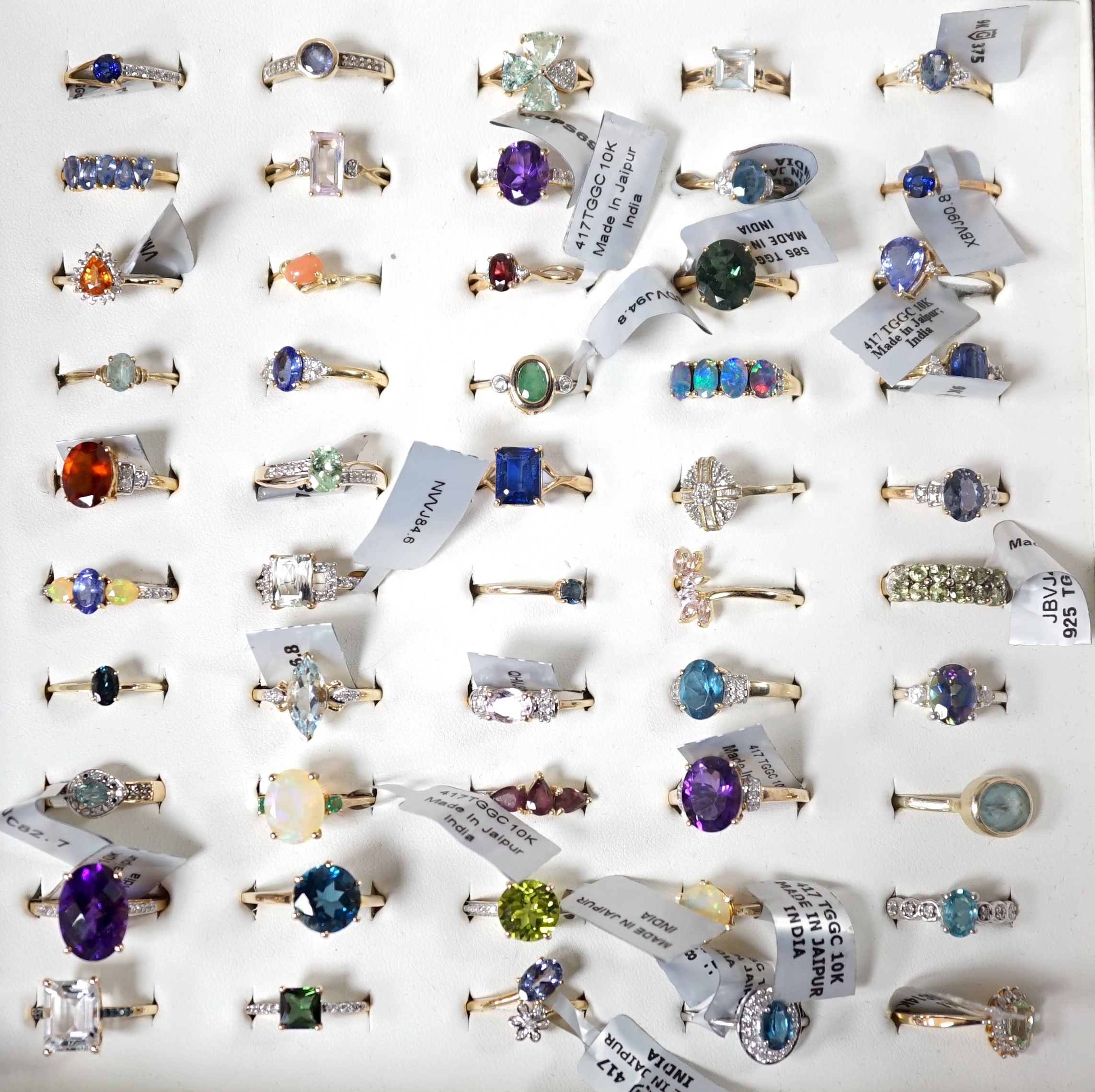 A collection of forty five assorted 9ct gold and gem set rings, including opal, emerald and amethyst, one 14ct gold and gem set ring and four 925 rings.